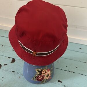 Coach Size ML Bucket Red Hat Brim 23.5” Material is Nylon all weather